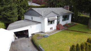 Photo 1: 952 BEAUMONT Drive in North Vancouver: Edgemont House for sale : MLS®# R2720261