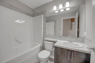 Photo 15: 405 Redstone View NE in Calgary: Redstone Row/Townhouse for sale : MLS®# A1224923