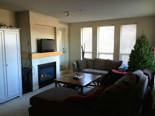 Photo 4: 211 1211 VILLAGE GREEN Way in Squamish: Downtown SQ Condo for sale in "ROCKCLIFFE" : MLS®# V1097471
