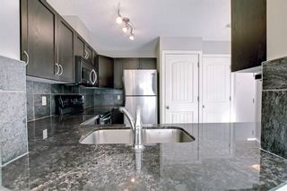 Photo 7: 10 301 Village Mews SW in Calgary: Patterson Apartment for sale : MLS®# A1246152