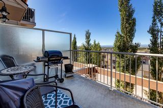 Photo 25: 8 124 Rockyledge View NW in Calgary: Rocky Ridge Row/Townhouse for sale : MLS®# A2000574
