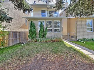 Photo 1: 2017 36 Avenue SW in Calgary: Altadore Detached for sale : MLS®# A2003032