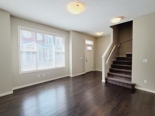 Photo 5: 106 Panatella Walk NW in Calgary: Panorama Hills Row/Townhouse for sale : MLS®# A1206869