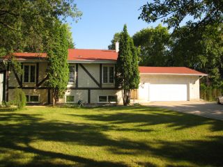 Photo 1: 730 CLOUTIER Drive in WINNIPEG: Fort Garry / Whyte Ridge / St Norbert Residential for sale (South Winnipeg)  : MLS®# 1015026