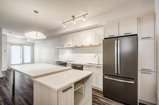 Photo 8: 103 730 5 Street NE in Calgary: Renfrew Apartment for sale : MLS®# A2011808