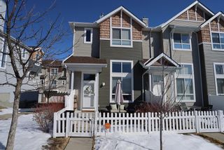 Photo 1: 85 Tuscany Court NW in Calgary: Tuscany Row/Townhouse for sale : MLS®# A2033070