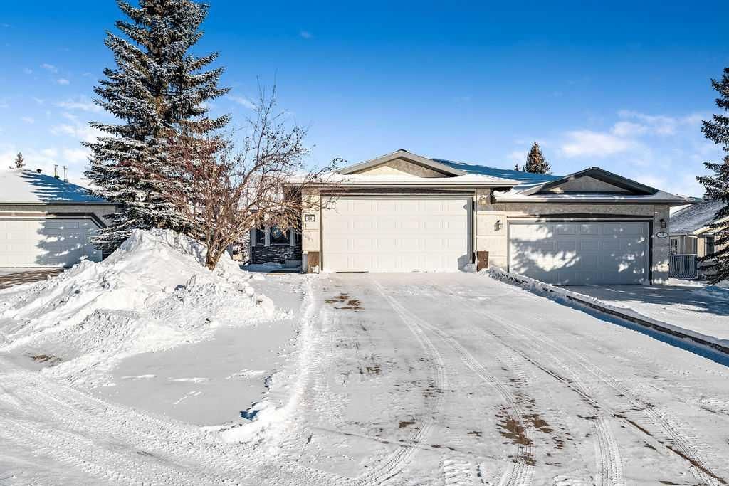 Main Photo: 64 Arbour Cliff Court NW in Calgary: Arbour Lake Semi Detached (Half Duplex) for sale : MLS®# A2103545