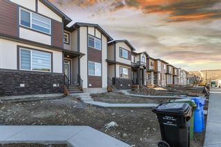 Photo 3: 167 Wolf Creek Avenue SE in Calgary: C-281 Row/Townhouse for sale : MLS®# A2006523