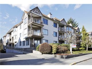 Photo 1: 107 5489 201 Street in Langley: Langley City Condo for sale in "Canim Court" : MLS®# F1403388