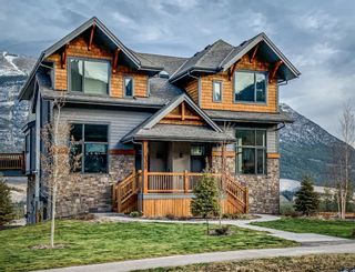 Photo 1: 1328 Three Sisters Parkway: Canmore Semi Detached for sale : MLS®# A1062409