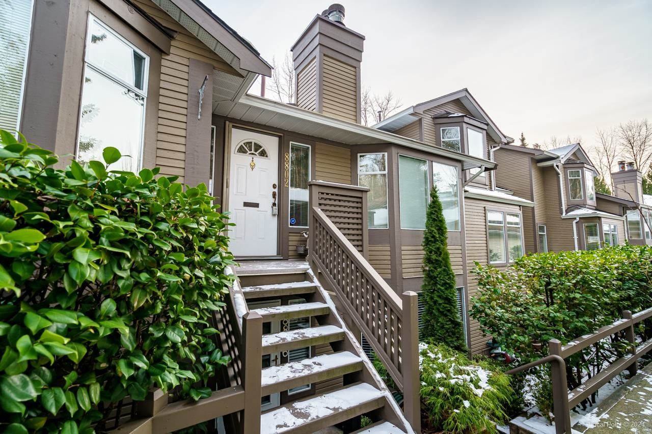 Main Photo: 8802 LARKFIELD Drive in Burnaby: Forest Hills BN Townhouse for sale in "PRIMROSE HILL" (Burnaby North)  : MLS®# R2842182