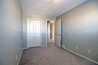 Photo 18: 384 Panatella Boulevard NW in Calgary: Panorama Hills Row/Townhouse for sale : MLS®# A2011748