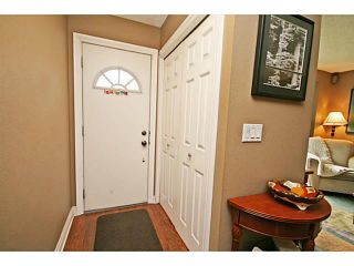 Photo 3: 151 123 QUEENSLAND Drive SE in CALGARY: Queensland Townhouse for sale (Calgary)  : MLS®# C3627911