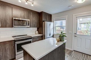 Photo 10: 112 Cranbrook Square SE in Calgary: Cranston Row/Townhouse for sale : MLS®# A1220404