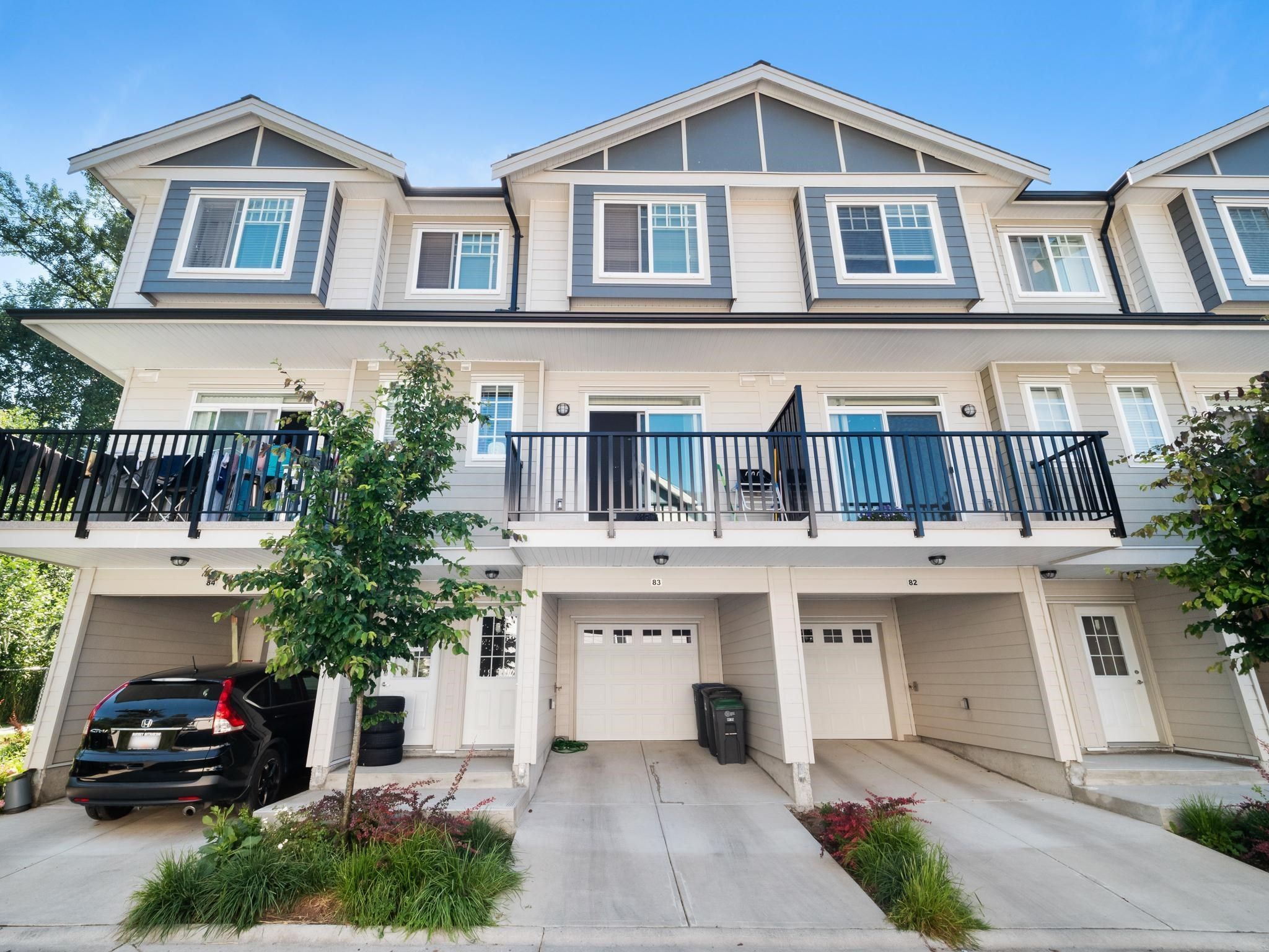 Main Photo: 83 13898 64 Avenue in Surrey: Sullivan Station Townhouse for sale : MLS®# R2712484