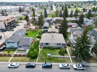 Main Photo: 3815 10 Avenue SW in Calgary: Rosscarrock Full Duplex for sale : MLS®# A2052431