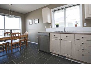 Photo 6: 113 55 FAIRWAYS Drive NW: Airdrie Townhouse for sale : MLS®# C3565868
