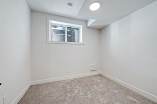 Photo 32: 915 Remington Road NE in Calgary: Renfrew Semi Detached (Half Duplex) for sale : MLS®# A1258901