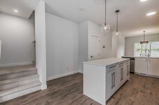 Photo 13: 7443 202 Avenue SE in Calgary: C-390 Row/Townhouse for sale : MLS®# A2077842