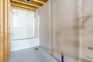 Photo 9: 68 Stenlea Gate: Carstairs Semi Detached (Half Duplex) for sale : MLS®# A2033053