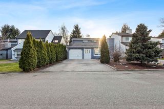 Photo 1: 6047 BROOKS Crescent in Surrey: Cloverdale BC House for sale in "Brookswood" (Cloverdale)  : MLS®# R2854850