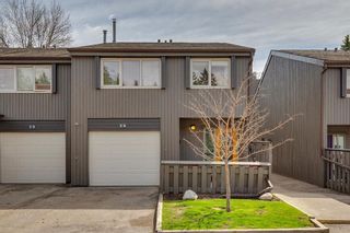 Photo 2: 14 2225 Oakmoor Drive SW in Calgary: Palliser Row/Townhouse for sale : MLS®# A2129148