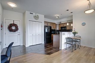 Photo 24: 213 26 VAL GARDENA View SW in Calgary: Springbank Hill Apartment for sale : MLS®# A1095989
