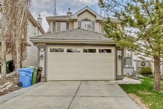 Photo 1: 416 Springbank Place SW in Calgary: Springbank Hill Detached for sale : MLS®# A2048259