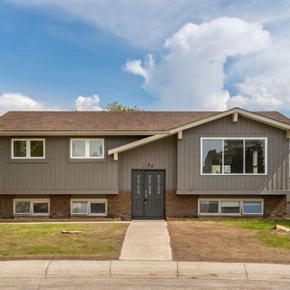 Photo 1: 56 Rundlefield Close NE in Calgary: Rundle Detached for sale : MLS®# A2052186