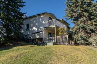 Photo 3: 112 Strathlorne Mews SW in Calgary: Strathcona Park Row/Townhouse for sale : MLS®# A2087332