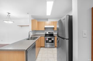 Photo 2: 211 5438 RUPERT Street in Vancouver: Collingwood VE Condo for sale in "QUEENSLAND" (Vancouver East)  : MLS®# R2705337