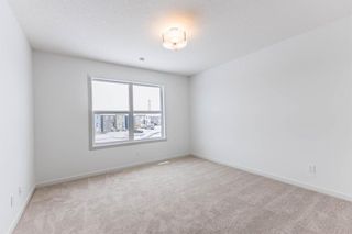 Photo 23: 220 Hotchkiss Drive in Calgary: C-385 Semi Detached (Half Duplex) for sale : MLS®# A2127862