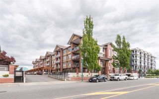 Photo 2: 410 5650 201A Street in Langley: Langley City Condo for sale in "PADDINGTON STATION" : MLS®# R2473018