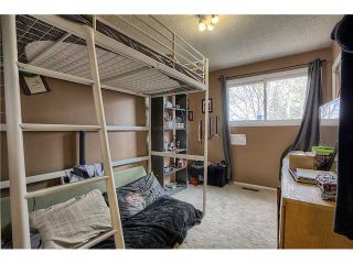 Photo 12: 869 QUEENSLAND Drive SE in CALGARY: Queensland Residential Attached for sale (Calgary)  : MLS®# C3616074