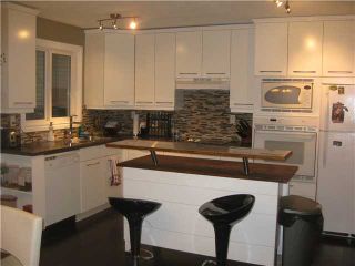 Photo 2: 7647 23 Street SE in CALGARY: Ogden Lynnwd Millcan Residential Attached for sale (Calgary)  : MLS®# C3521403