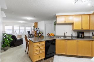 Photo 2: 207 345 Rocky Vista Park NW in Calgary: Rocky Ridge Apartment for sale : MLS®# A2022543