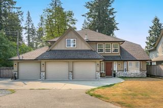 Photo 1: 20324 42 Avenue in Langley: Brookswood Langley House for sale in "BROOKSWOOD" : MLS®# R2724012
