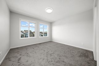 Photo 15: 50 Cranbrook Gardens SE in Calgary: Cranston Row/Townhouse for sale : MLS®# A2037909