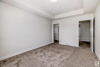 Photo 25: 5705 CAUTLEY Crescent in Edmonton: Zone 55 House Half Duplex for sale : MLS®# E4385289