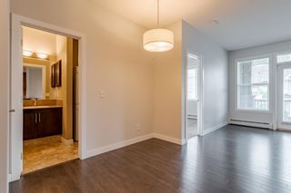Photo 10: 303 48 Panatella Road NW in Calgary: Panorama Hills Apartment for sale : MLS®# A1231118