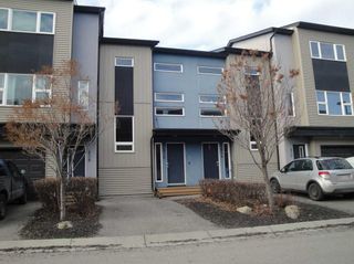 Photo 1: 436 Covecreek Circle NE in Calgary: Coventry Hills Row/Townhouse for sale : MLS®# A2095386