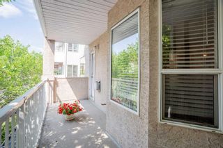 Photo 31: 305 Sierra Morena Green SW in Calgary: Signal Hill Row/Townhouse for sale : MLS®# A2067886
