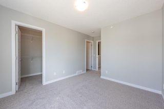 Photo 21: 121 301 REDSTONE Boulevard in Calgary: Redstone Row/Townhouse for sale : MLS®# A1246267
