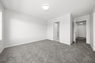 Photo 16: 50 Cranbrook Gardens SE in Calgary: Cranston Row/Townhouse for sale : MLS®# A2037909