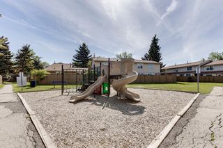 Photo 28: 56 123 Queensland Drive SE in Calgary: Queensland Row/Townhouse for sale : MLS®# A1228124