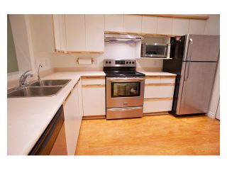 Photo 2: 111 6860 RUMBLE Street in Burnaby: South Slope Condo for sale in "GOVERNOR'S WALK" (Burnaby South)  : MLS®# V935758