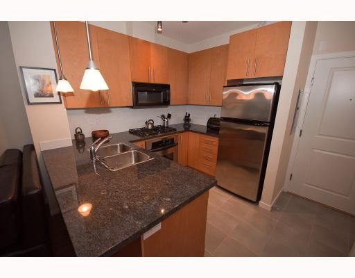 Main Photo: 110 3551 FOSTER Avenue in Vancouver: Collingwood VE Condo for sale in "FINALE" (Vancouver East)  : MLS®# V777305