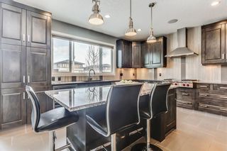 Photo 13: 141 TREMBLANT Heights SW in Calgary: Springbank Hill House for sale : MLS®# C4175148