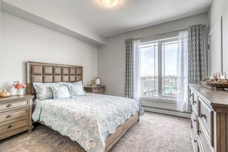 Photo 16: 401 300 Auburn Meadows Manor SE in Calgary: Auburn Bay Apartment for sale : MLS®# A1193805