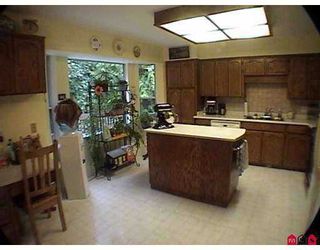 Photo 2: 7442 142ND Street in Surrey: East Newton House for sale in "Nichol Creek" : MLS®# F2720770